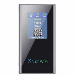 A silver and black Xplorer Hotspot device with its screen illuminated, displaying "4G", "5GHz", battery life (93%), "Highspeed", "1,899 MB Used", and a QR code with "Set WiFi by QR Code" below it. The XNET WIFI logo is visible at the bottom of the device.